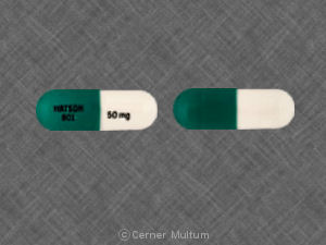 capsule adderall and white green